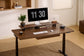 Vernal Core3 walnut adjustable standing desk in home office